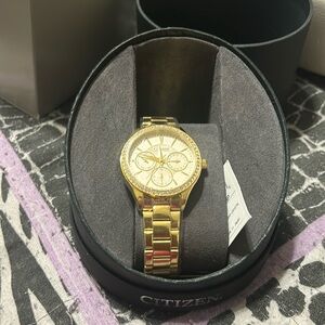 Citizen quartz watch.